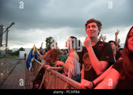 BONTIDA, ROMANIA - JULY 18, 2018: Crowd of people having fun at a Delinquent Habits hip hop concert during Electric Castle festival Stock Photo