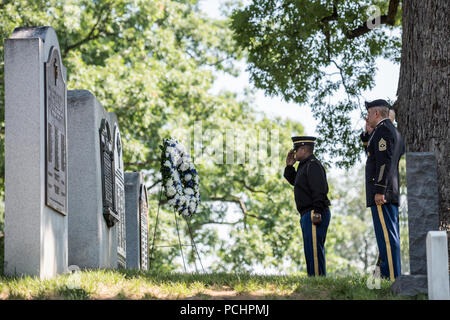 Sgt. Maj. Ralph Martinez (far right front), regimental sergeant major, U.S. Army Chaplain Corps; and  Chaplain (Maj. Gen.) Paul K. Hurley (far right rear), chief of chaplains, U.S. Army Chaplain Corps; lay a wreath at Chaplain’s Hill in Section 2 of Arlington National Cemetery, Arlington, Virginia, July 27, 2018. The wreath-laying was in honor of the 243rd U.S. Army Chaplain Corps Anniversary. (U.S. Army photo by Elizabeth Fraser / Arlington National Cemetery / released) Stock Photo