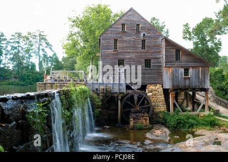 Waterfall and old gristmill at Historic Yates Mill County Park in Raleigh North Carolina Stock Photo