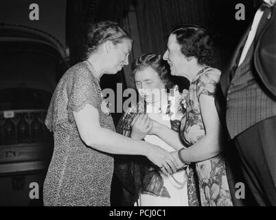 Helen Keller, center, with First Lady Eleanor Roosevelt, left, and Anne Sullivan Macy in 1936. Helen Keller (June 27, 1880 – June 1, 1968) was an American author, political activist, and lecturer. She was the first deaf-blind person to earn a bachelor of arts degree. Stock Photo