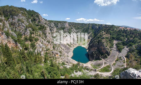 Blue Lake (Croatian: Modro jezero or Plavo jezero) is a karst lake located near Imotski in Croatia. It lies in a deep collapse sinkhole. Stock Photo