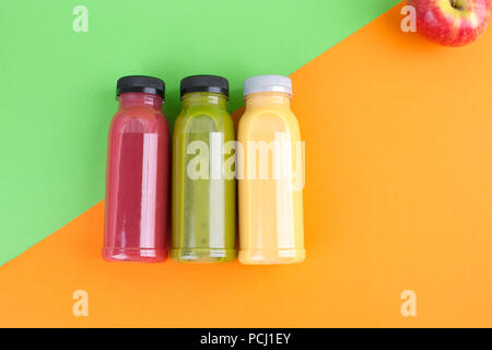 different juice in bottles. A healthy meal with you. Detox drinks are fresh. Top view Stock Photo