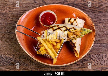 Pork Burrito with French potato Stock Photo