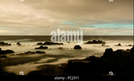 Seashore of the bay of Pombas aka Doves in Long exposure at Terceira island, Azores, Portugal Stock Photo