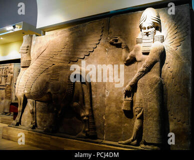 Bas of human-headed winged bull statues aka lamassu- 31-10-2011 Baghdad, Iraq Stock Photo