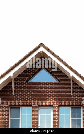 A large beautiful modern brick house close-up on a white background. Stock Photo