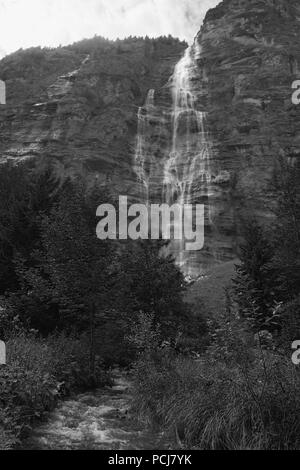 Mürrenbach Falls (also Mürrenbachfall or Mürrelbachfälle) near Stechelberg in the upper Lauterbrunnen valley, Bernese Oberland, Switzerland.  b/w Stock Photo