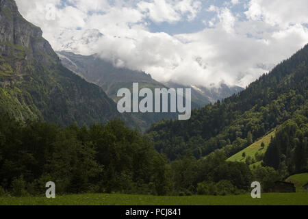 The spectacular upper Lauterbrunnen valley at Stechelberg, with the Lauterbrunnen Wall blocking the head of the valley, Bernese Oberland, Switzerland Stock Photo