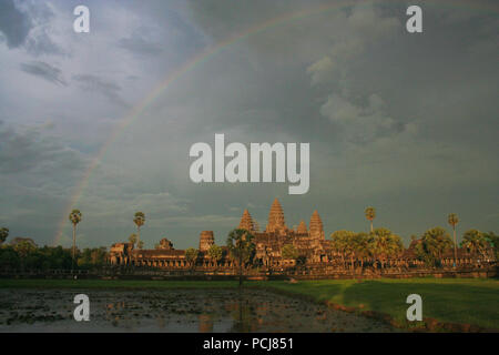 Rainbow over Angkor Wat at Sunset Stock Photo