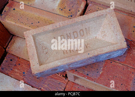 Pile of bricks on building site Stock Photo - Alamy