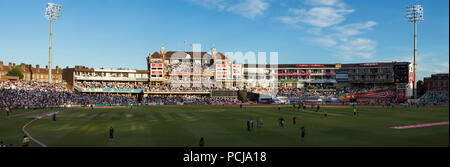 The Micky Stewart Members' Pavilion overlooking 20 20 day night match and the cricket pitch / wicket of The Oval cricket ground (The Kia Oval) Vauxhall, London. UK. (100) Stock Photo