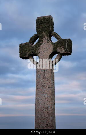 Duchess Cross granite memorial to Elizabeth Duchess of Argyll at dusk on Isle of Iona Inner Hebrides Scotland UK Stock Photo