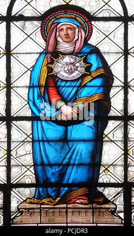 Seven Sorrows of the Virgin Mary, stained glass window in the Basilica of Notre Dame des Victoires in Paris, France Stock Photo