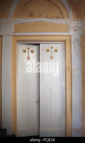 Damaged door place in building of Luther Church inside. Stock Photo