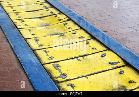 Yellow Metal Plate . industrial anti-fall floor panels Stock Photo