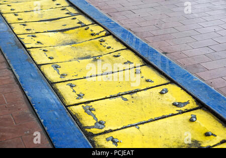 Yellow Metal Plate . industrial anti-fall floor panels Stock Photo