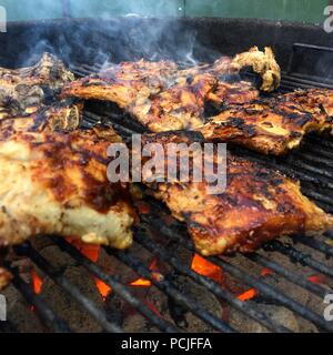 Grilled spare ribs on a barbecue Stock Photo
