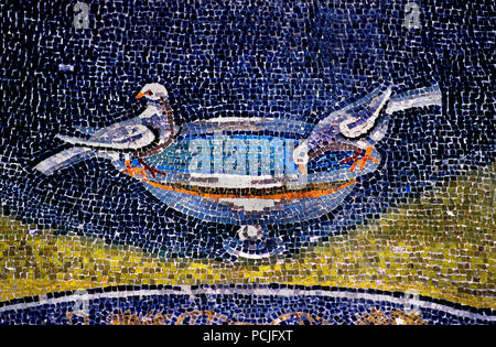 Holy spirit in Mausoleum of Galla Placidia in Ravenna (386 - 450 AD) Mosaics ( late Roman and Byzantine architecture,) Emilia-Romagna - Northern Italy. ( UNESCO World Heritage site ) pigeon, Stock Photo