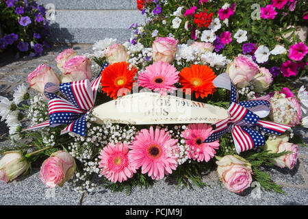 Flowers lying on a memorial to American soldiers who died following the ...
