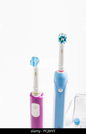 Electric Rechargeable Toothbrushes for the family on light background Stock Photo