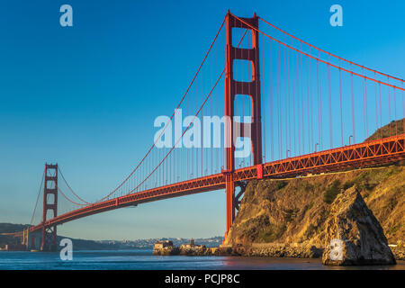 Sunset glow on the Golden Gate Bridge in San Francisco. Stock Photo