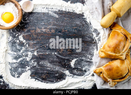 Chilean independence day baking concept. fiestas patrias. Chilean typical EMPANADAS DE PINO for independence day party. Stock Photo