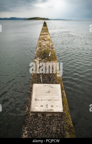 View of the causeway leading to Cramond Island on the background during high tide. Edinburgh, Scotland, UK. Stock Photo