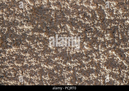Rough surface of the concrete wall of the house. Stock Photo