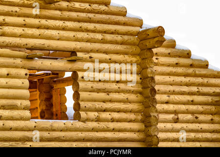 The frame of an unfinished rural house made of timber. Stock Photo