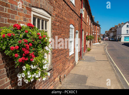 Wareham Dorset England August 02, 2018 Old cottages in West Street with floral decorations Stock Photo