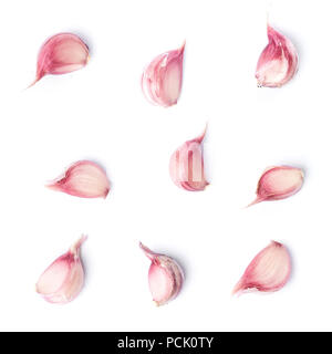 Nine garlic cloves isolated on white background Stock Photo