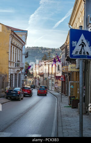 Veliko Tarnovo city, Bulgaria - March 24, 2017. Commercial old street with cars Stock Photo