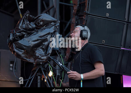 BONTIDA, ROMANIA - JULY 20, 2018: Cameraman taking a video on the Main Stage at a concert during Electric Castle festival Stock Photo