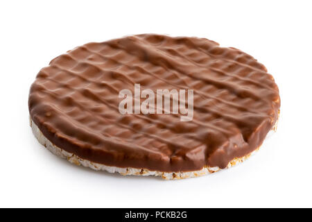 Whole chocolate rice cake isolated on white. Stock Photo