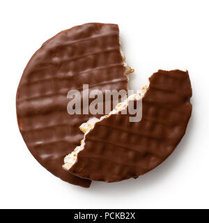 Broken chocolate rice cake isolated on white from above. Two pieces. Stock Photo
