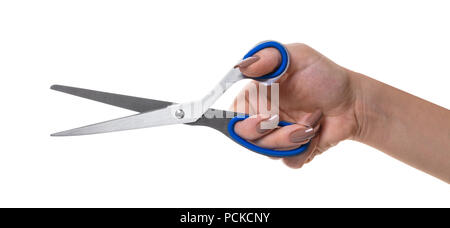 scissors in a female hand on white isolated background Stock Photo