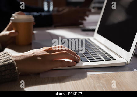 Business colleagues working on laptop Stock Photo