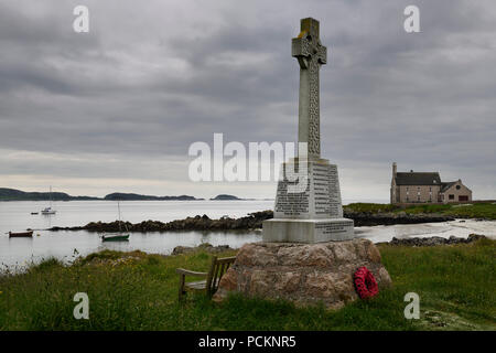 Marble Celtic cross war memorial on Martyr's Bay Sound of Iona South of Baile Mor village on Isle of Iona Inner Hebrides Scotland UK Stock Photo