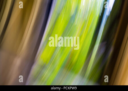 Abstract airy background in brown-green colors. Stylish artistic texture.  Casual colored stripes, harmonic natural shades. Beautiful light painting. Stock Photo