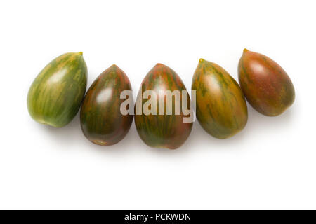 Green Tiger plum tomatoes isolated on white, top view Stock Photo