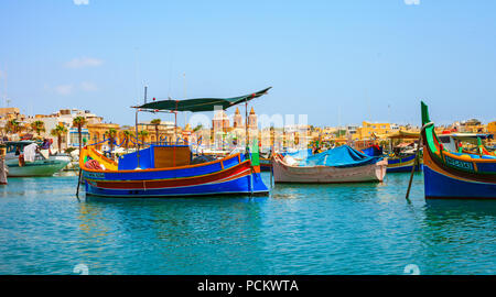 Colorful fishing village of Marsaxlokk in Malta Stock Photo