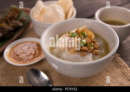 bubur ayam. chicken porridge with soup. indonesian culinary Stock Photo