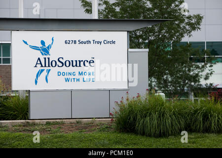 A logo sign outside of the headquarters of AlloSource in Centennial ...