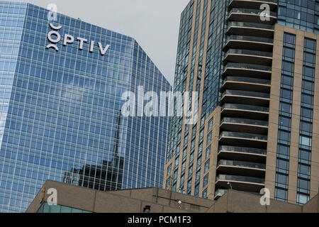 A logo sign outside of the headquarters of Optiv Security, Inc., in ...