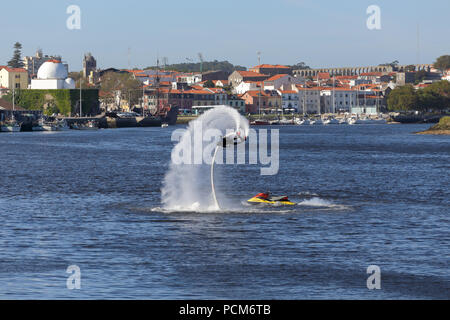 Vila do Conde, Portugal - May 16, 2015: Flyboard training and demonstration in the mouth of the Ave river Stock Photo