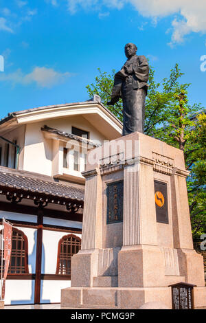 Statue of Oishi Kuranosuke, the leader of 47 loyal ronin at Sengaku-ji Templr in Tokyo, Japan Stock Photo