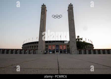 Berlin, Germany. 02nd Aug, 2018. A cloudless sky frames the Olympic Stadium in the evening. The 24th European Athletics Championships (07 August 2018 to 12 August 2018) will take place here. Credit: Paul Zinken/dpa/Alamy Live News Stock Photo