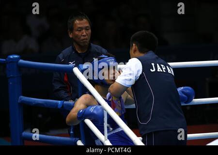Japan's Ryota Murata (C) talks with Hirokuni Moto (R) head coach during the London 2012 Olympic Games Boxing Men's Middle (75kg) Final at ExCeL in London, UK, August 11, 2012. Credit: Koji Aoki/AFLO SPORT/Alamy Live News Stock Photo