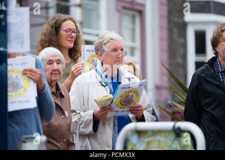 Aberystwyth Wles UK, Friday 03 August 2018  A group of Quakers holding a vigil  on a  street corner in the centre of Aberystwyth in support of the Ride 4 Equality and the Common Good.   Setting  off from Cumbria on July 22nd, and arriving in London today, the riders  are petitioning the government and calling for an immediate end to the dismantling of the UK's welfare state.   Photo © Keith Morris / Alamy Live News Stock Photo