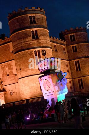 Dorset, UK, 3 Aug 2018. Love robot and Lulworth Castle at Bestival, Dorset, UK Credit: Finnbarr Webster/Alamy Live News Stock Photo